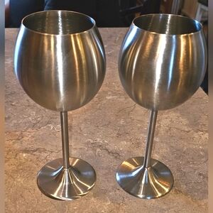 Two stainless steel wine glasses